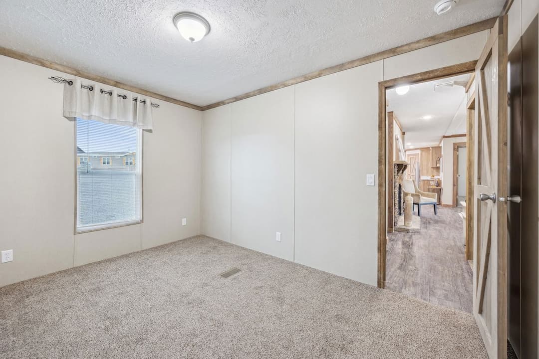 Rawhide 32' wide bedroom home features